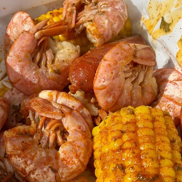 LandShark Seafood & Catfish shrimp boil with seasoned shrimp, sausage, and corn on the cob.