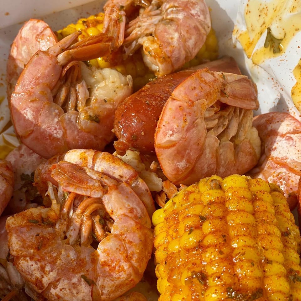 LandShark Seafood & Catfish shrimp boil with seasoned shrimp, sausage, and corn on the cob.
